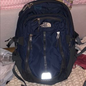 dark blue north face backpack
